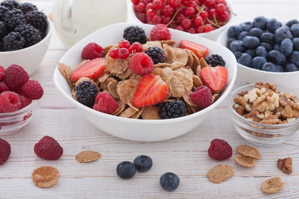 Breakfast - berries, fruit and muesli — стоковое фото